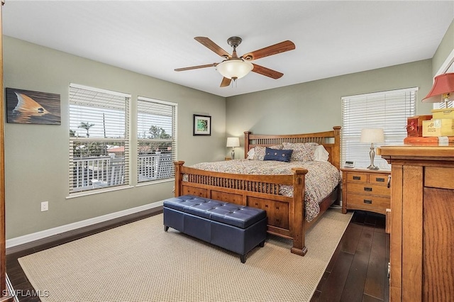 bedroom with wood-type flooring and ceiling fan