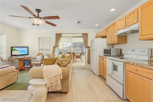 kitchen featuring ceiling fan, white appliances, light brown cabinetry, and light wood-type flooring