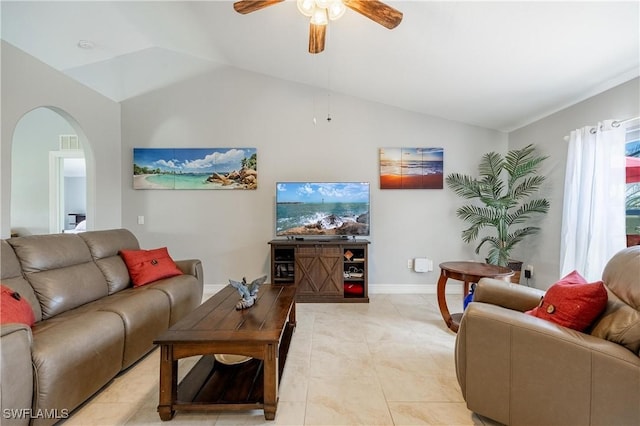 tiled living room featuring vaulted ceiling and ceiling fan