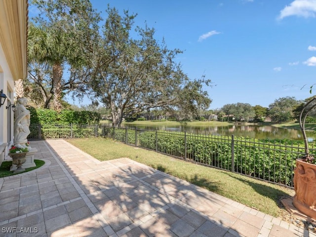 view of patio featuring a water view