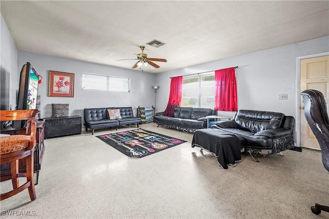 living room featuring ceiling fan