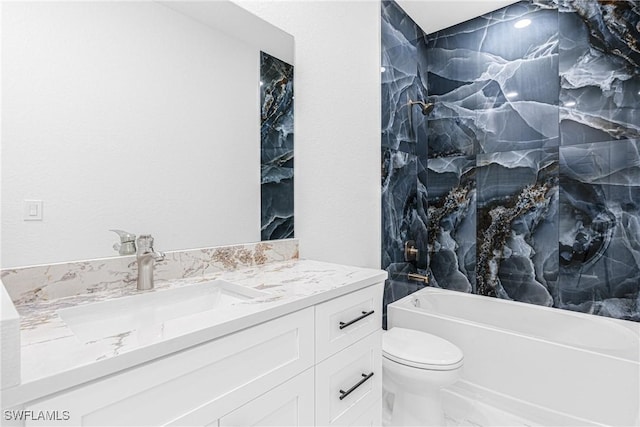 full bathroom featuring vanity, shower / bathing tub combination, and toilet