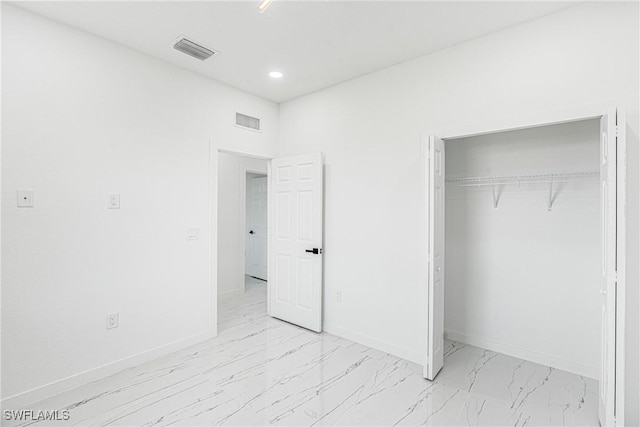 unfurnished bedroom featuring a closet