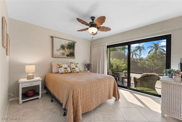 tiled bedroom featuring ceiling fan and access to outside