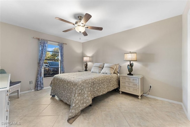 bedroom with light tile patterned floors and ceiling fan