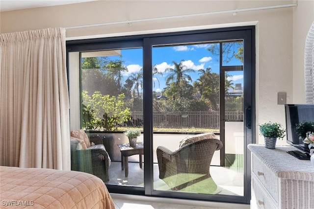 bedroom featuring multiple windows