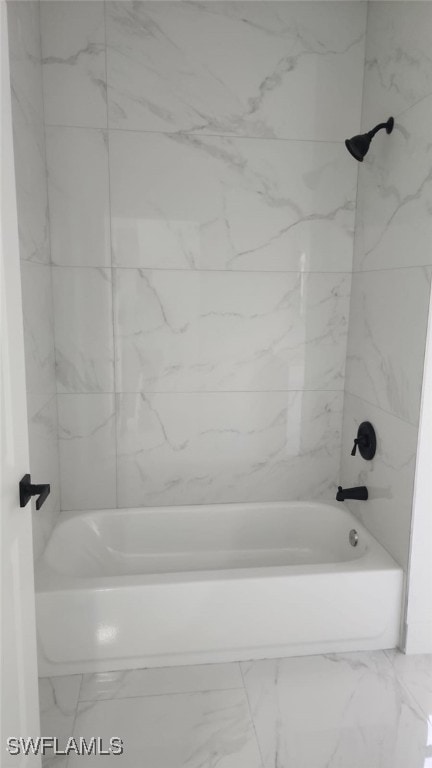 bathroom featuring marble finish floor