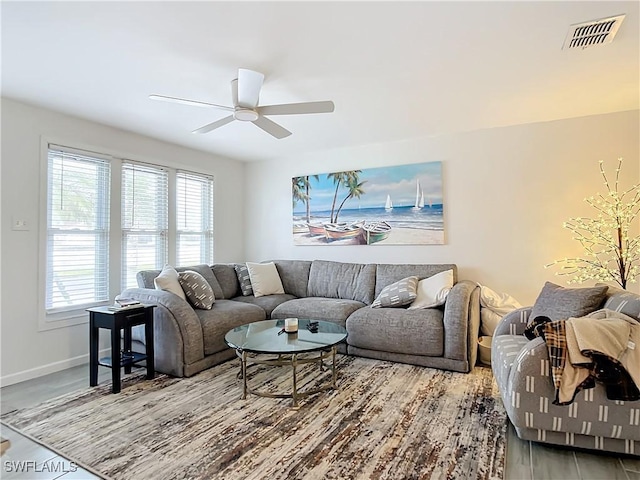 living room featuring ceiling fan