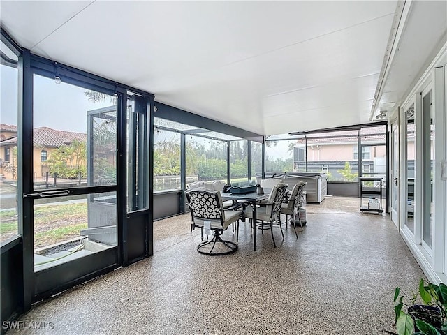 sunroom / solarium featuring a wealth of natural light