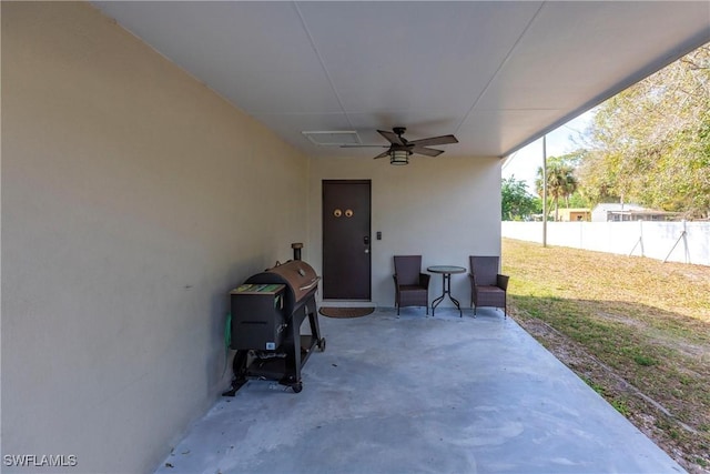 view of patio / terrace with a grill and ceiling fan