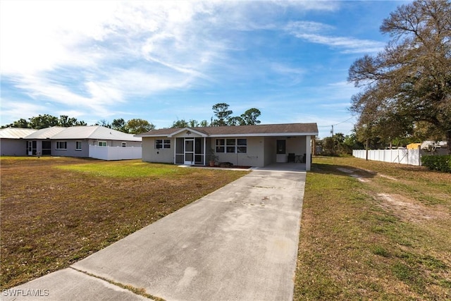 single story home with a carport and a front yard