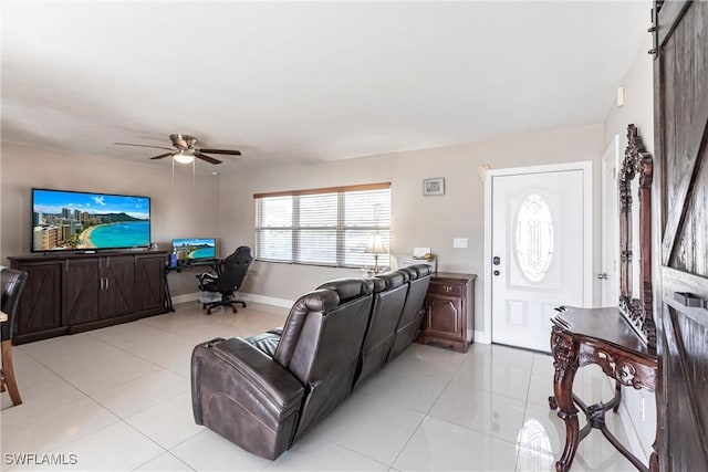 tiled living room with ceiling fan