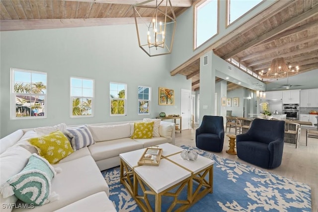 living room featuring wooden ceiling, plenty of natural light, beamed ceiling, and an inviting chandelier