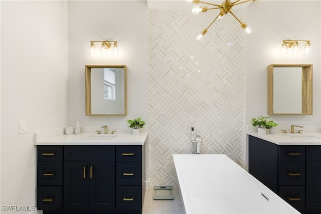 bathroom with vanity and a tub to relax in