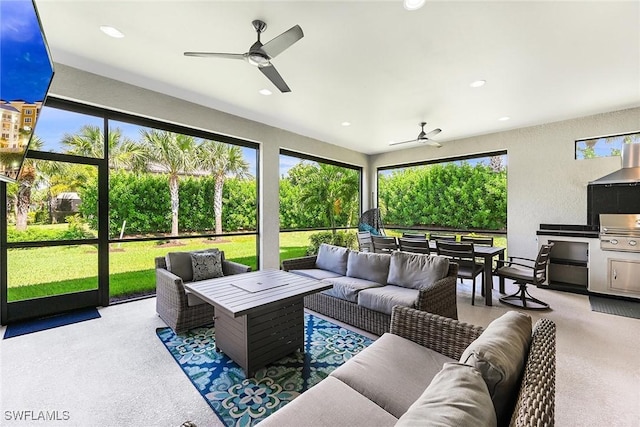 interior space with ceiling fan