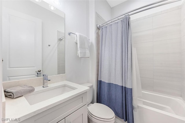 full bathroom featuring vanity, toilet, and shower / bath combo with shower curtain