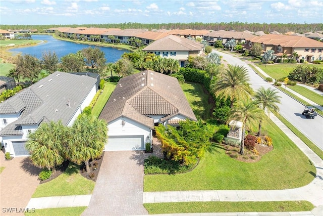 bird's eye view with a water view