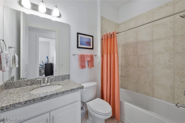 full bathroom featuring vanity, toilet, and shower / tub combo