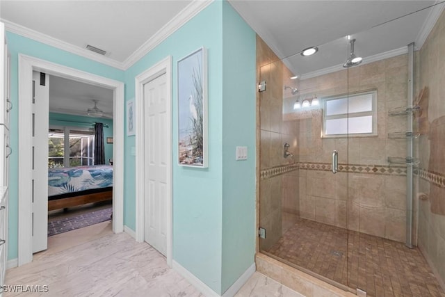 bathroom featuring crown molding and a shower with shower door