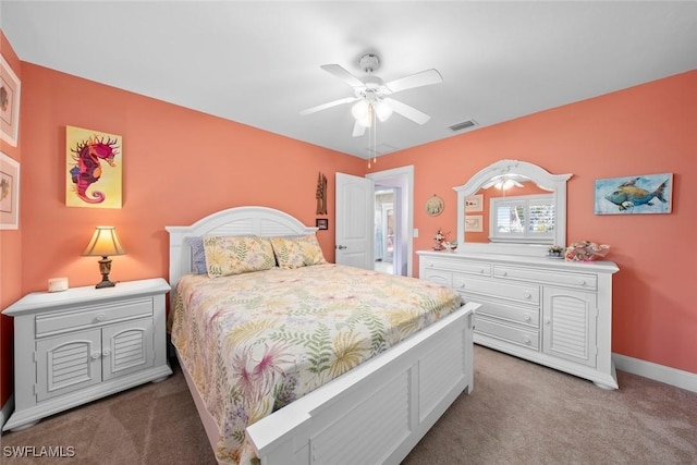 carpeted bedroom with ceiling fan