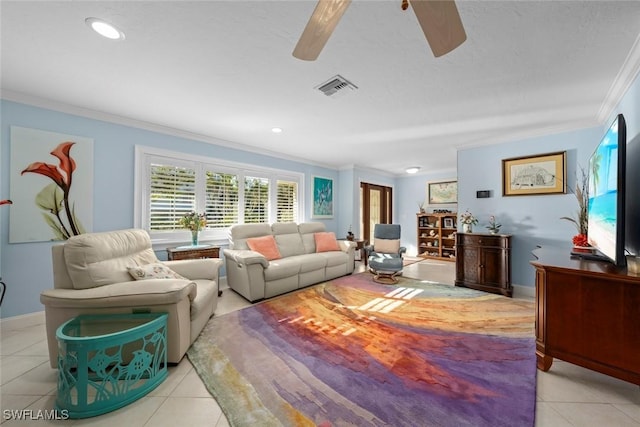 tiled living room with crown molding and ceiling fan