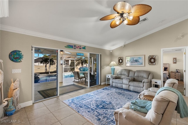 tiled living room with lofted ceiling, crown molding, and ceiling fan