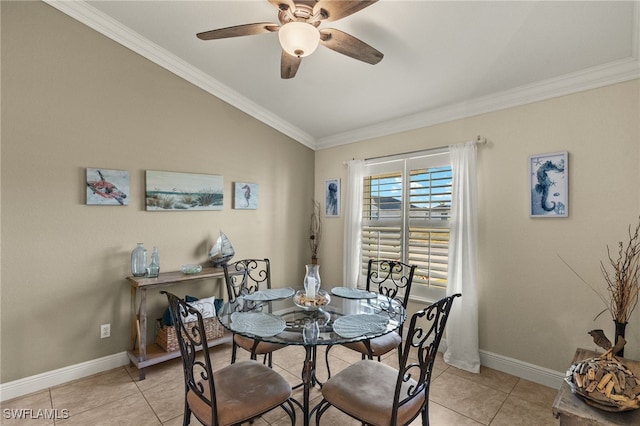 tiled dining area featuring ornamental molding and ceiling fan