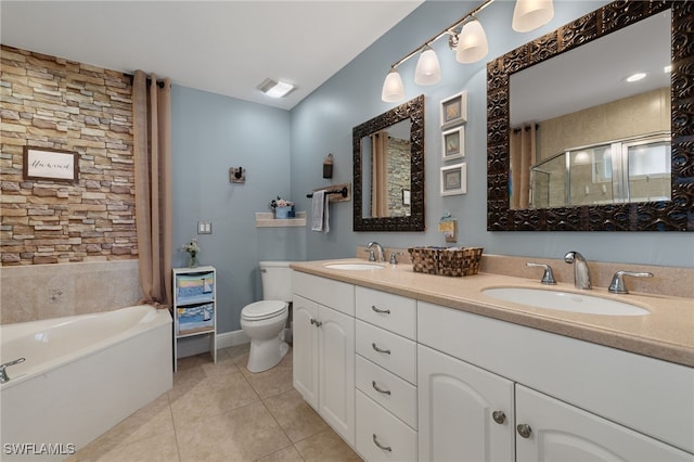 full bathroom with vanity, tile patterned floors, shower with separate bathtub, and toilet