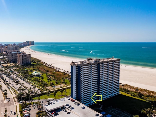 drone / aerial view with a view of the beach and a water view