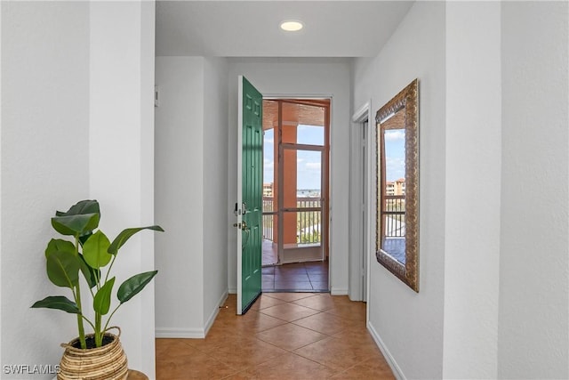 entryway featuring light tile patterned flooring