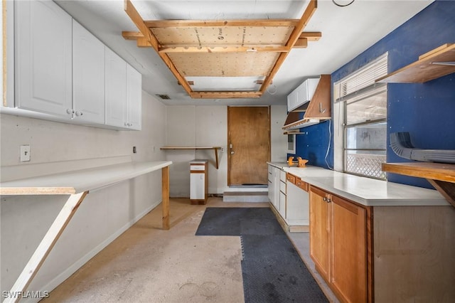 kitchen featuring white cabinets