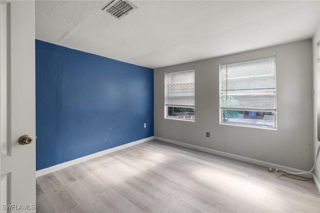 empty room featuring light wood-type flooring