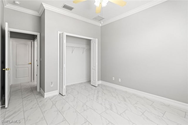 unfurnished bedroom with ornamental molding, ceiling fan, and a closet