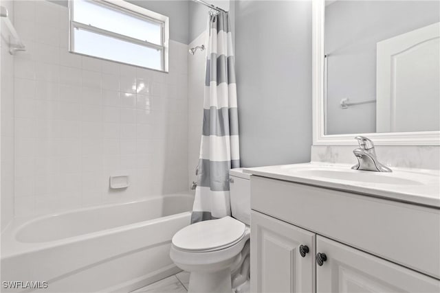 full bathroom featuring vanity, toilet, and shower / bath combo with shower curtain