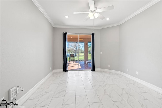 spare room with ceiling fan and ornamental molding