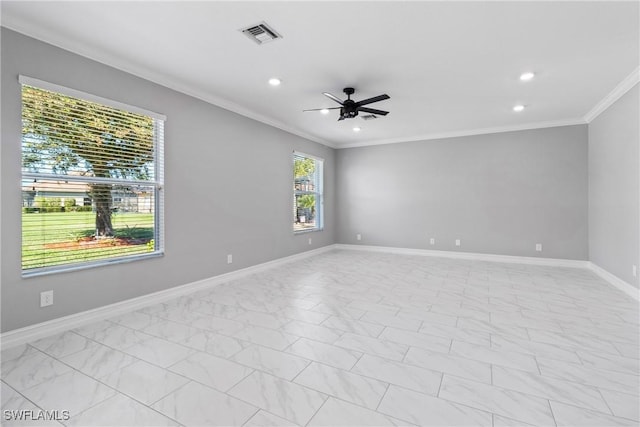 spare room featuring crown molding and ceiling fan