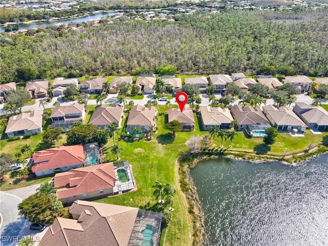 birds eye view of property featuring a water view