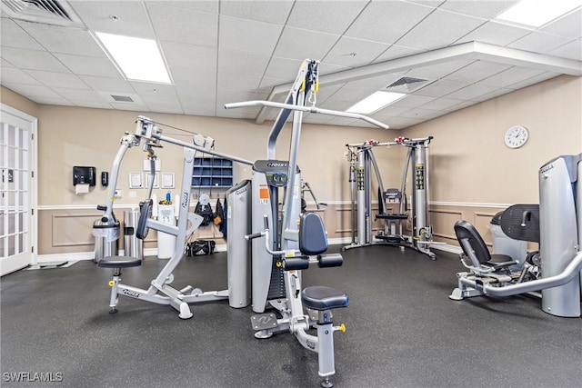 gym with a drop ceiling