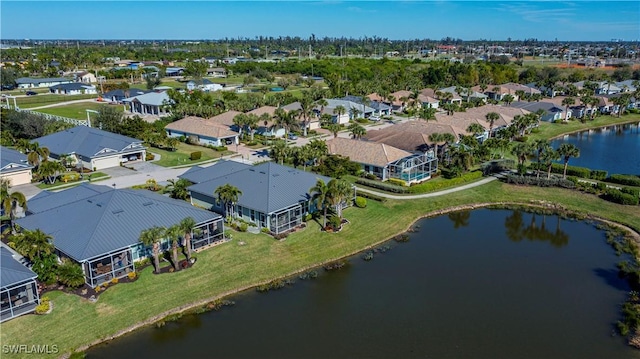 drone / aerial view with a water view