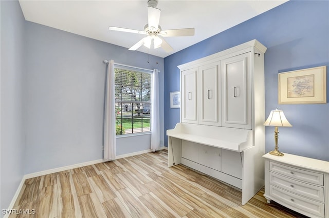 interior space with ceiling fan and light hardwood / wood-style flooring