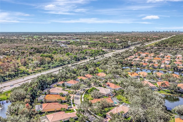 bird's eye view with a water view