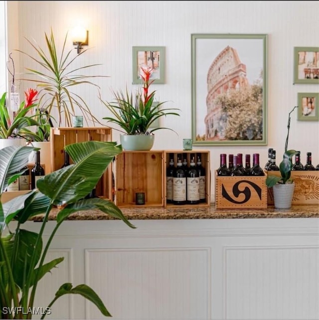 bar featuring dark stone counters