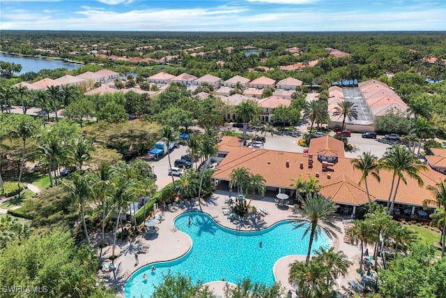 drone / aerial view with a water view