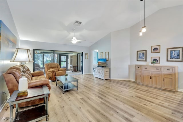 living room featuring ceiling fan, high vaulted ceiling, and light wood-type flooring