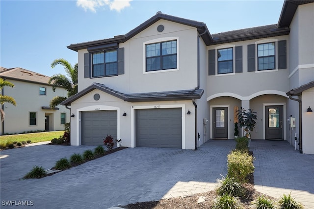 view of front of property with a garage