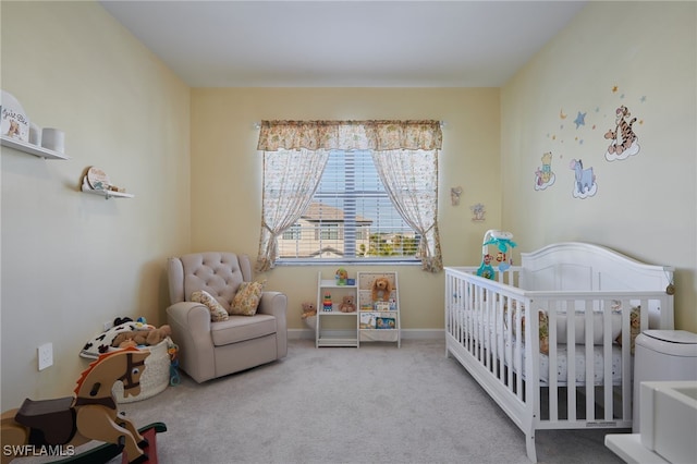 carpeted bedroom with a crib