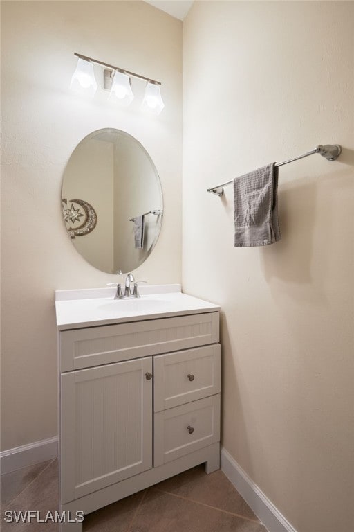 bathroom with vanity and tile patterned floors