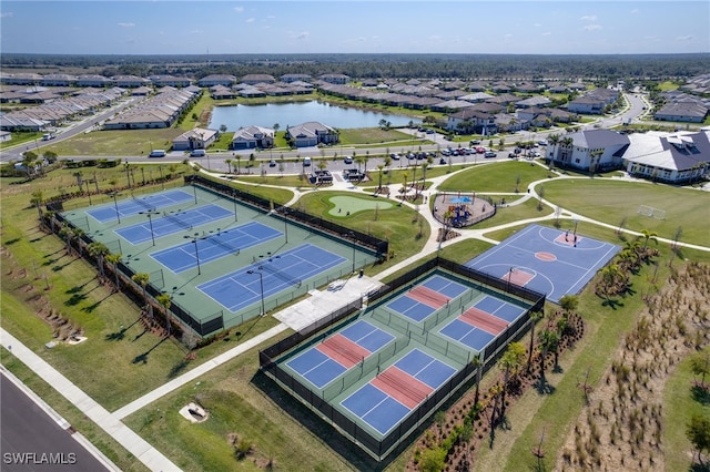 bird's eye view with a water view