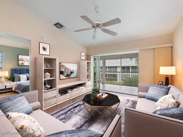 living room featuring ceiling fan, lofted ceiling, wood-type flooring, and a wealth of natural light