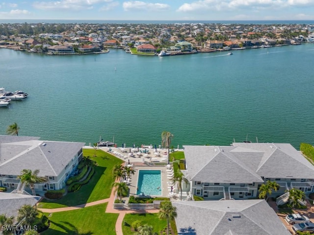 bird's eye view with a water view